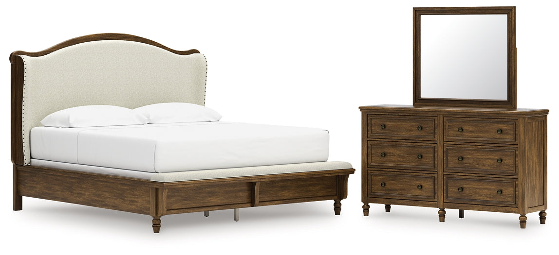 Sturlayne King Upholstered Panel Bed with Mirrored Dresser